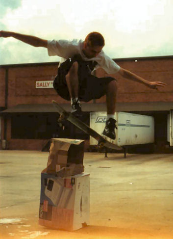 Scott LeMay pops a big ollie nose bonk out of the loading dock bank and over boxes
