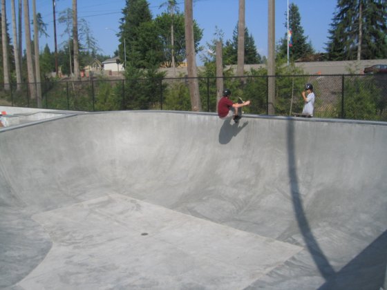 Solomon attempts a frontside air in the Mill Creek bowl