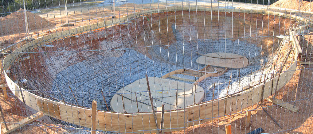 Alabaster skatepark's rounded, skull bowl during construction