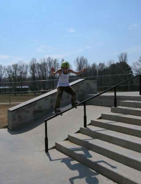 Alex Salillas lands into a perfect 50-50 down the 8-stair rail