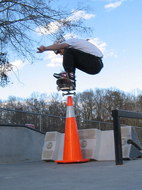 Steven pops a huge ollie over the cone