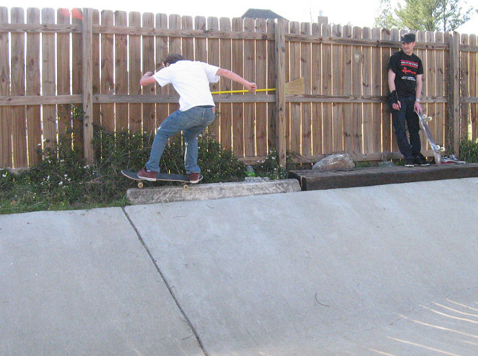 Cameron pops to a frontside pivot....and then to fakie!